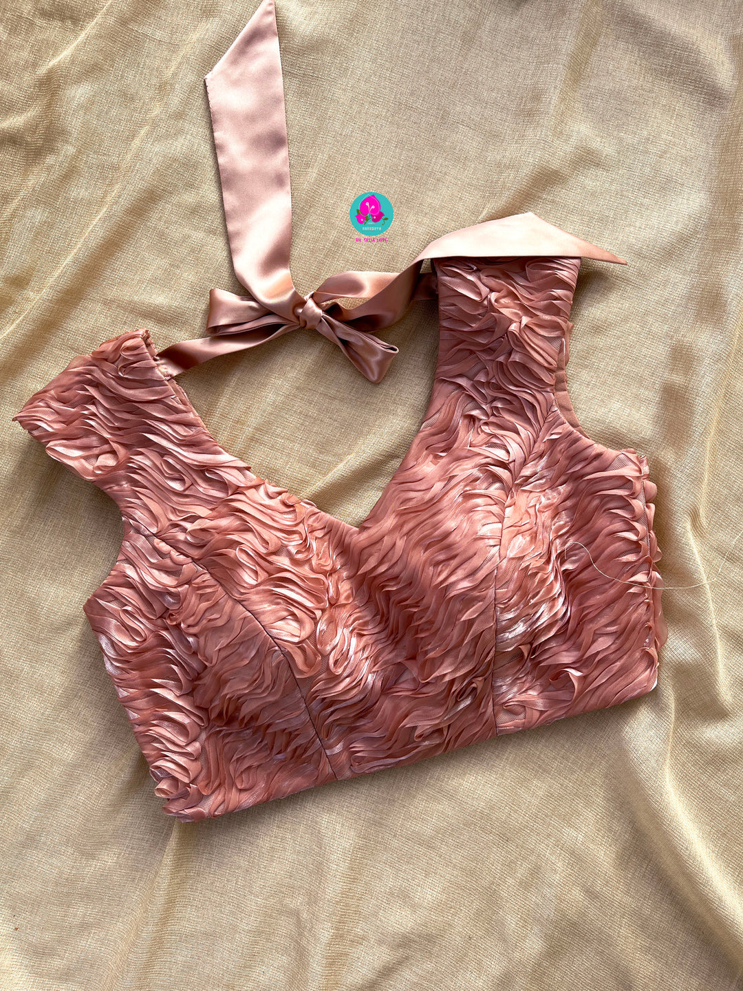 Crushed soft organza saree with Rose embroidery paired with Ribbon blouse
