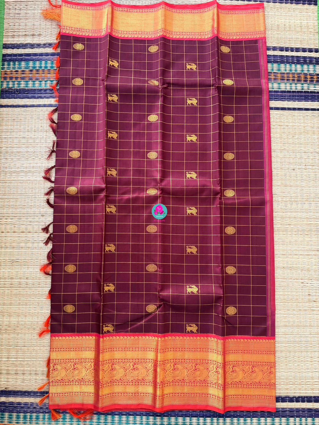 2G Zari Pure Kanchipuram saree in vintage vaira oosi checks paired with Full sleeve blouse