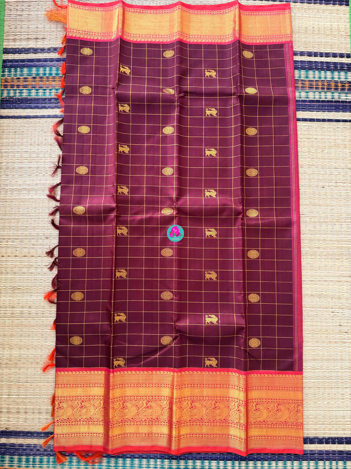 2G Zari Pure Kanchipuram saree in vintage vaira oosi checks paired with Full sleeve blouse