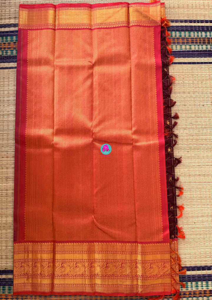 2G Zari Pure Kanchipuram saree in vintage vaira oosi checks paired with Full sleeve blouse