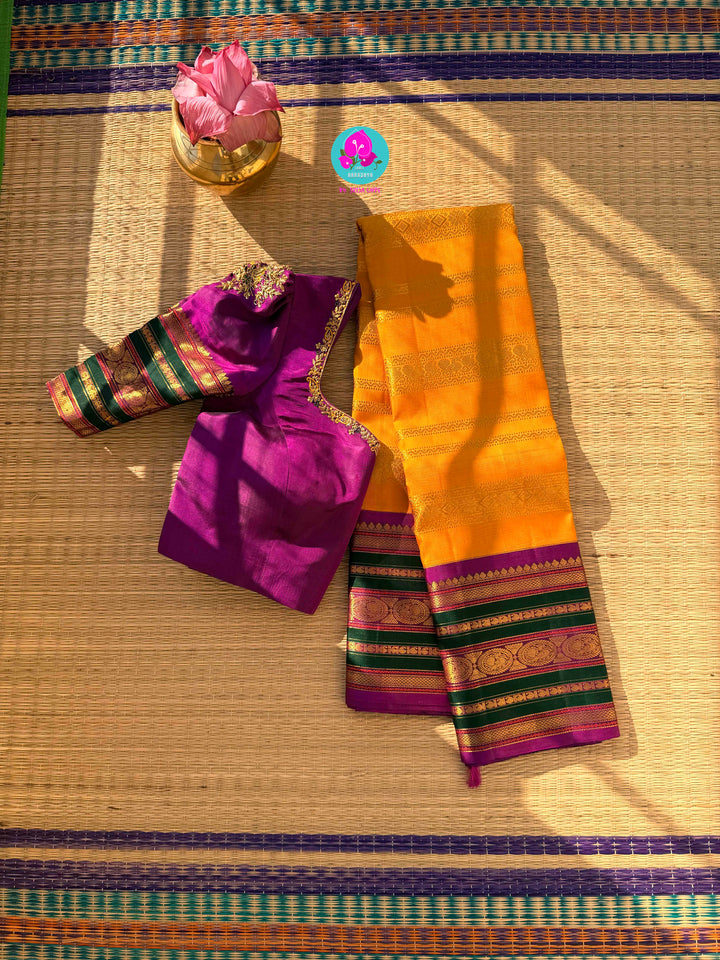 The 3G Zari Grandeur: Vintage Yellow Saree with Forest Green & Purple Edge with Hand embroidered blouse
