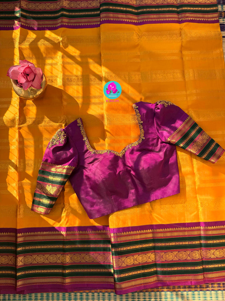 The 3G Zari Grandeur: Vintage Yellow Saree with Forest Green & Purple Edge with Hand embroidered blouse