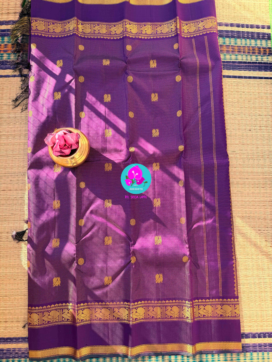 2g zari Vaira Oosi check butta saree in beautiful shade of purple with Hand Embroidered bottle green color fusion Blouse