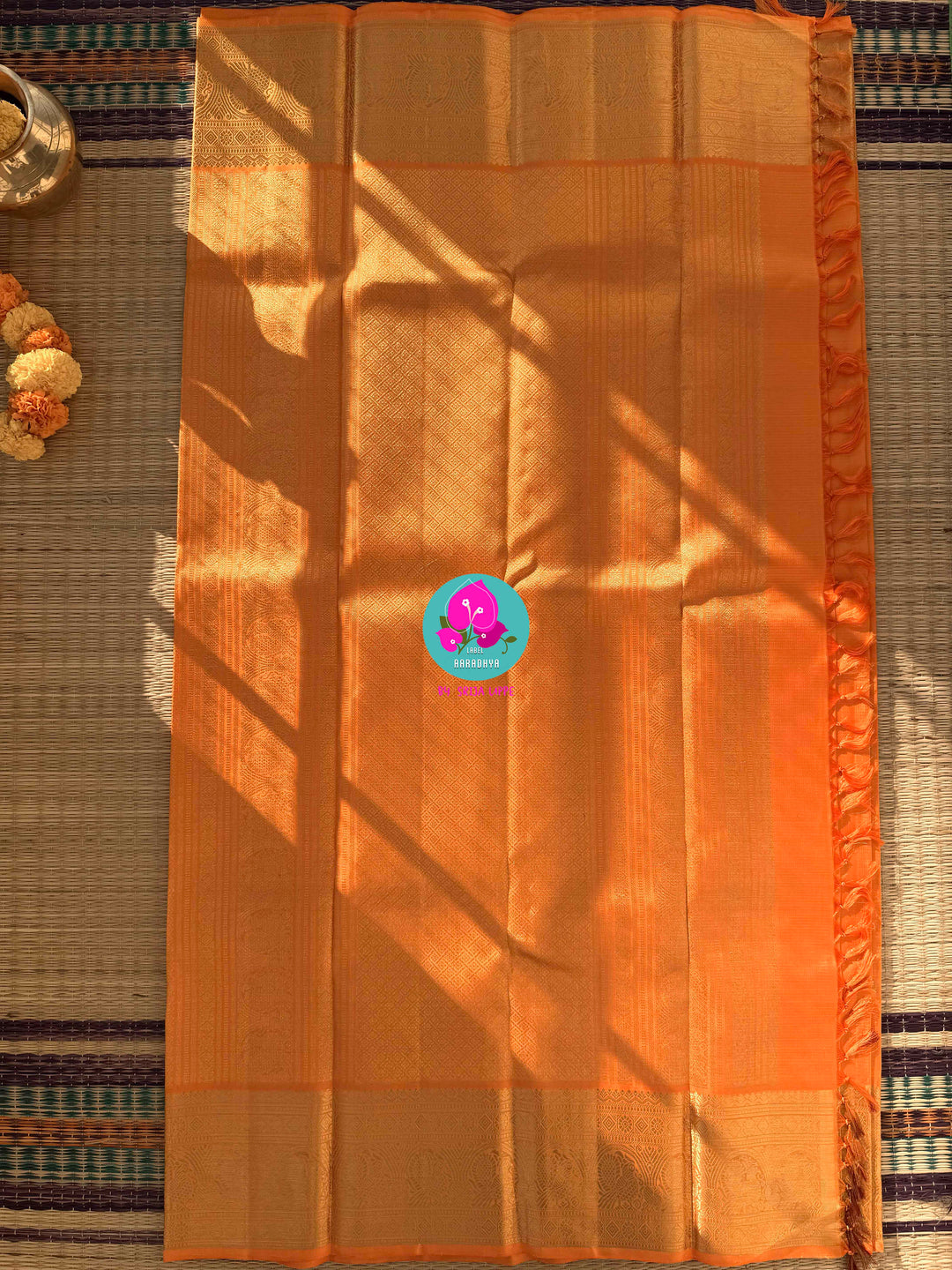 Pure Kanchipattu traditional Vaira oosi design Saree on beautiful lite orange color Paired with blouse