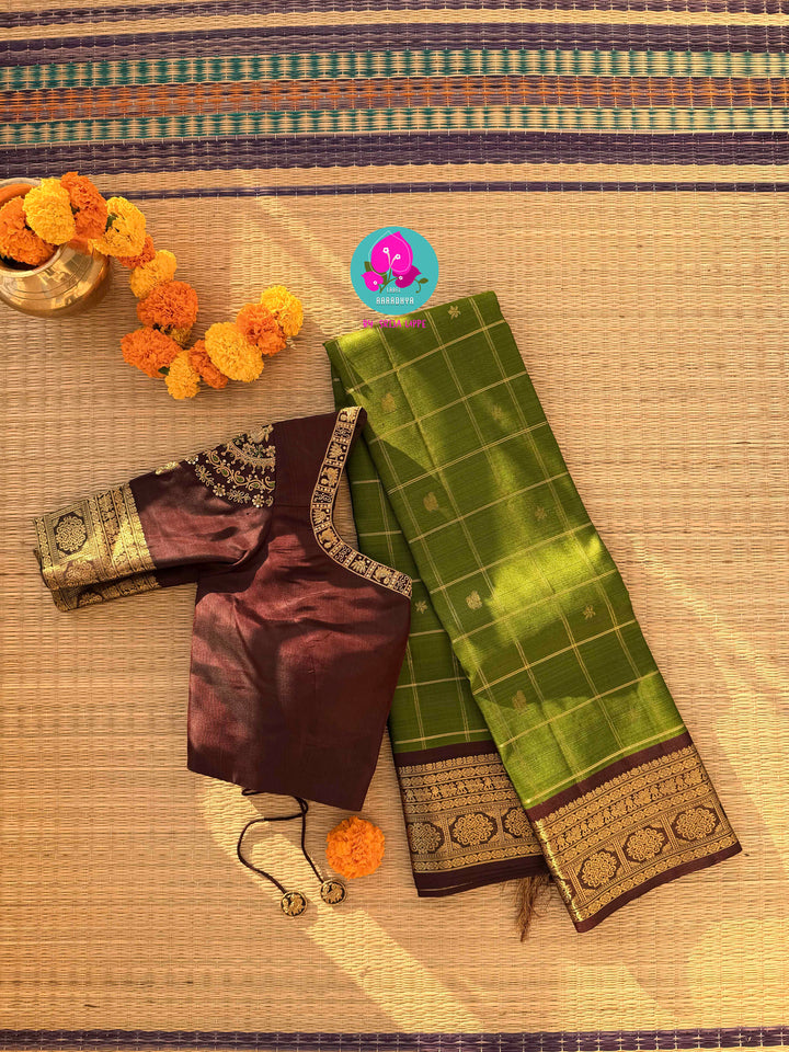 Nature inspired colors pattu saree in green and brown with hand embroidered blouse