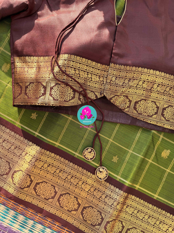 Nature inspired colors pattu saree in green and brown with hand embroidered blouse