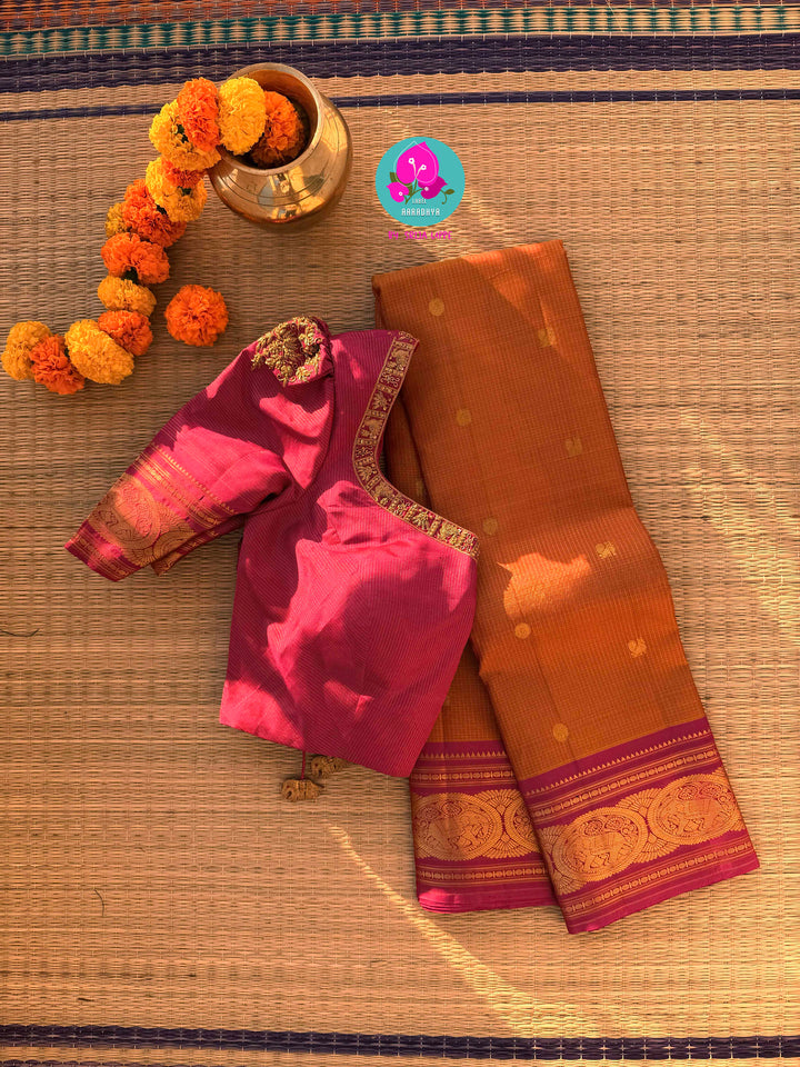 Fenugreek shade  Kanjivaram Vaira Oosi saree with Bold Pink Contrast and Embroidered Blouse