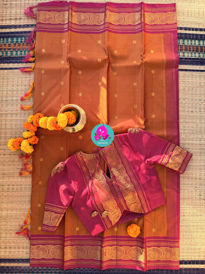 Fenugreek shade  Kanjivaram Vaira Oosi saree with Bold Pink Contrast and Embroidered Blouse