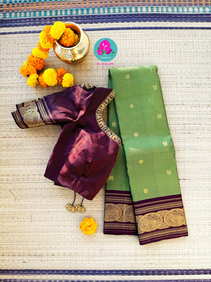 Mehendi green Kanjivaram Vaira Oosi with Bold brownish purple Contrast and Embroidered Blouse