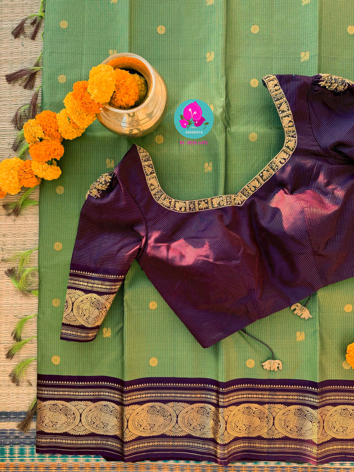 Mehendi green Kanjivaram Vaira Oosi with Bold brownish purple Contrast and Embroidered Blouse