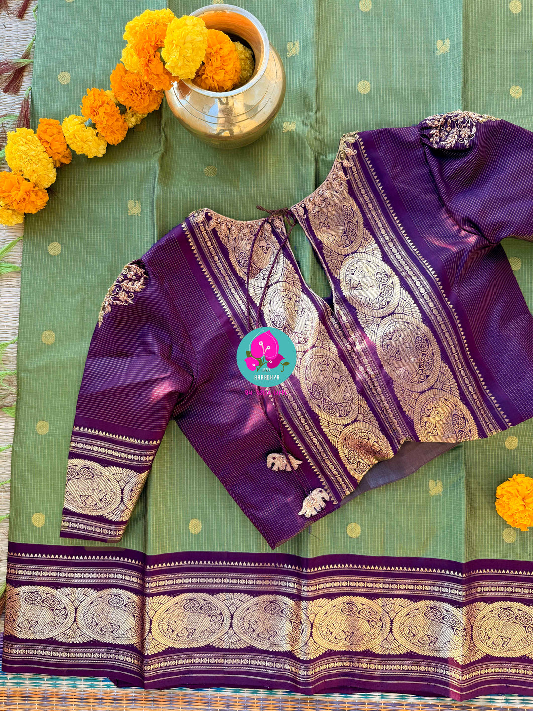 Mehendi green Kanjivaram Vaira Oosi with Bold brownish purple Contrast and Embroidered Blouse