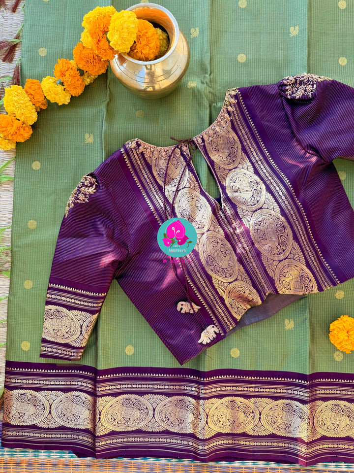 Mehendi green Kanjivaram Vaira Oosi with Bold brownish purple Contrast and Embroidered Blouse