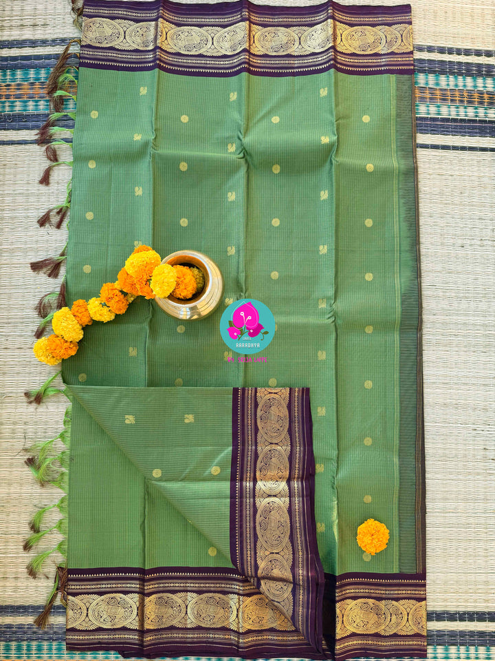 Mehendi green Kanjivaram Vaira Oosi with Bold brownish purple Contrast and Embroidered Blouse
