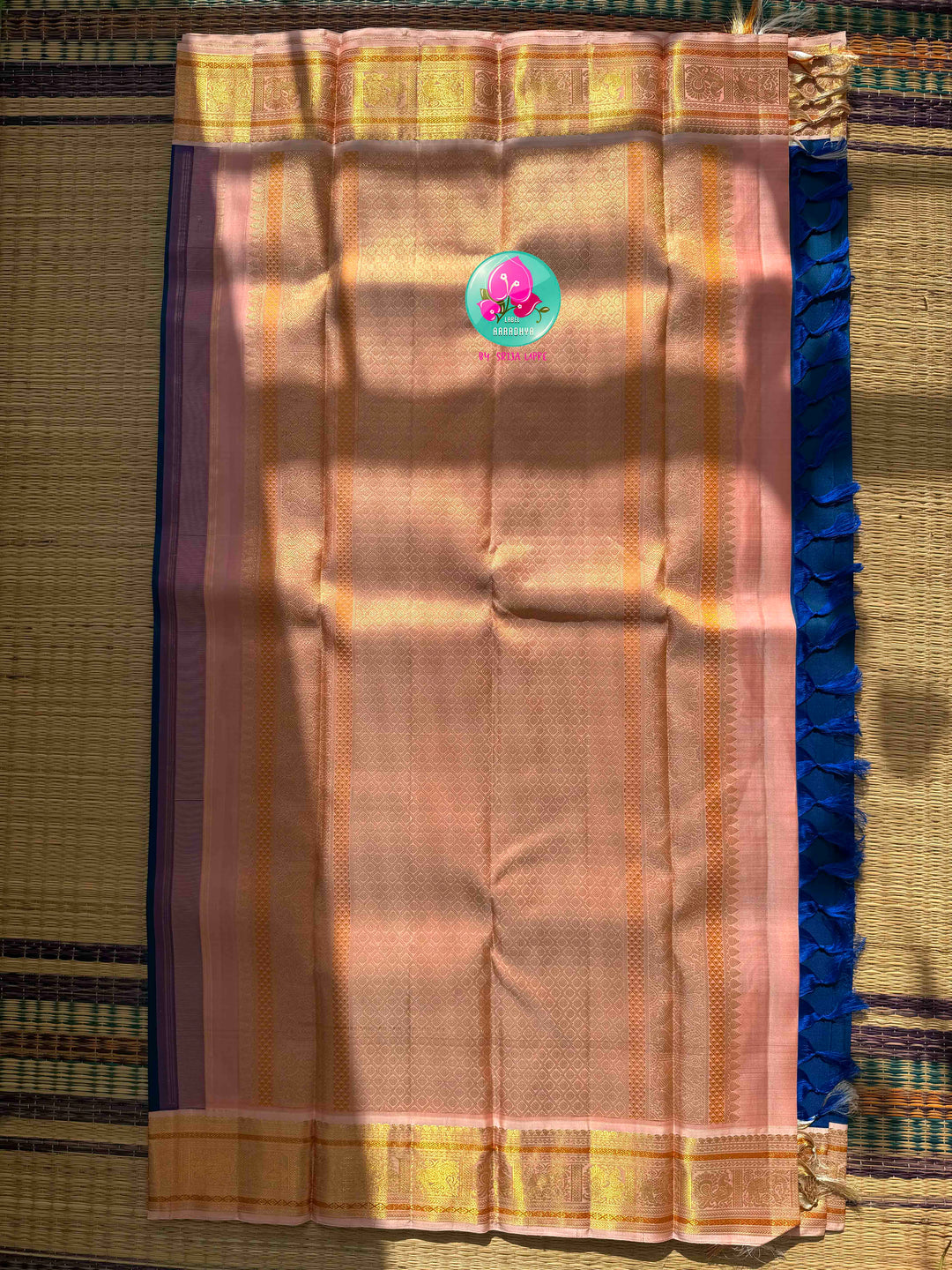 Imperial Sapphire & Petal Pink: Royal Blue Kanchipattu Silk Saree with Peacock Embroidery