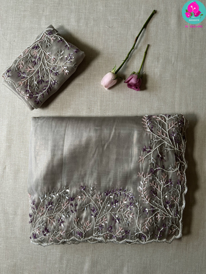 Soft tissue grey saree with embroidered sequins work
