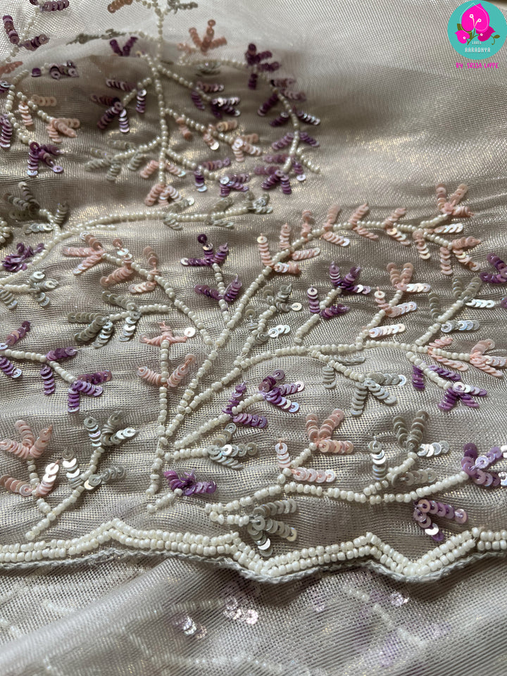 Soft tissue grey saree with embroidered sequins work