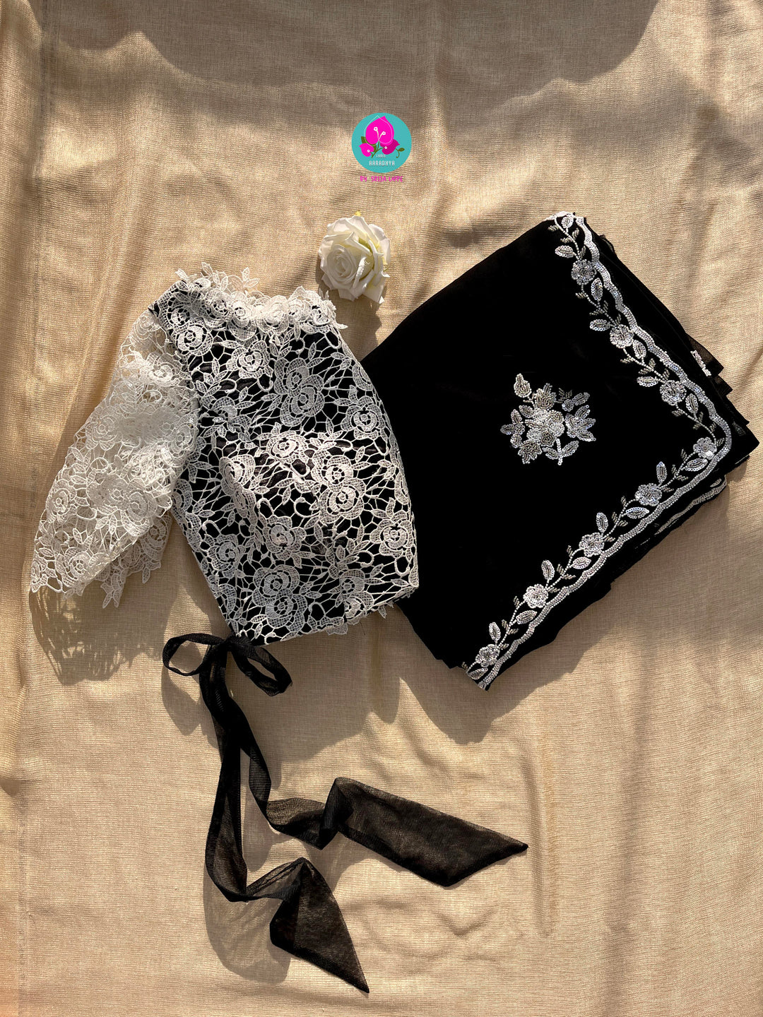Hand embroidered georgette Ariel saree Paired white Rosy netted blouse with sequins