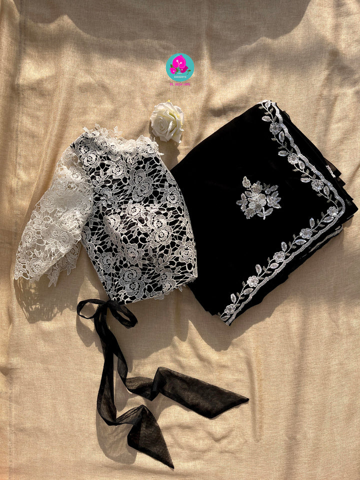 Hand embroidered georgette Ariel saree Paired white Rosy netted blouse with sequins