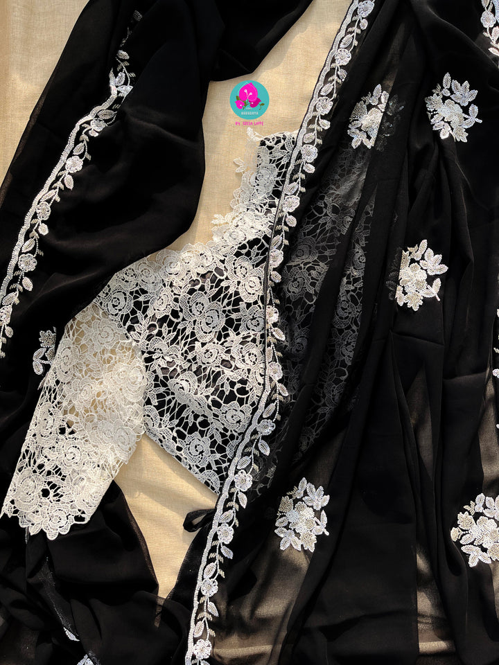 Hand embroidered georgette Ariel saree Paired white Rosy netted blouse with sequins