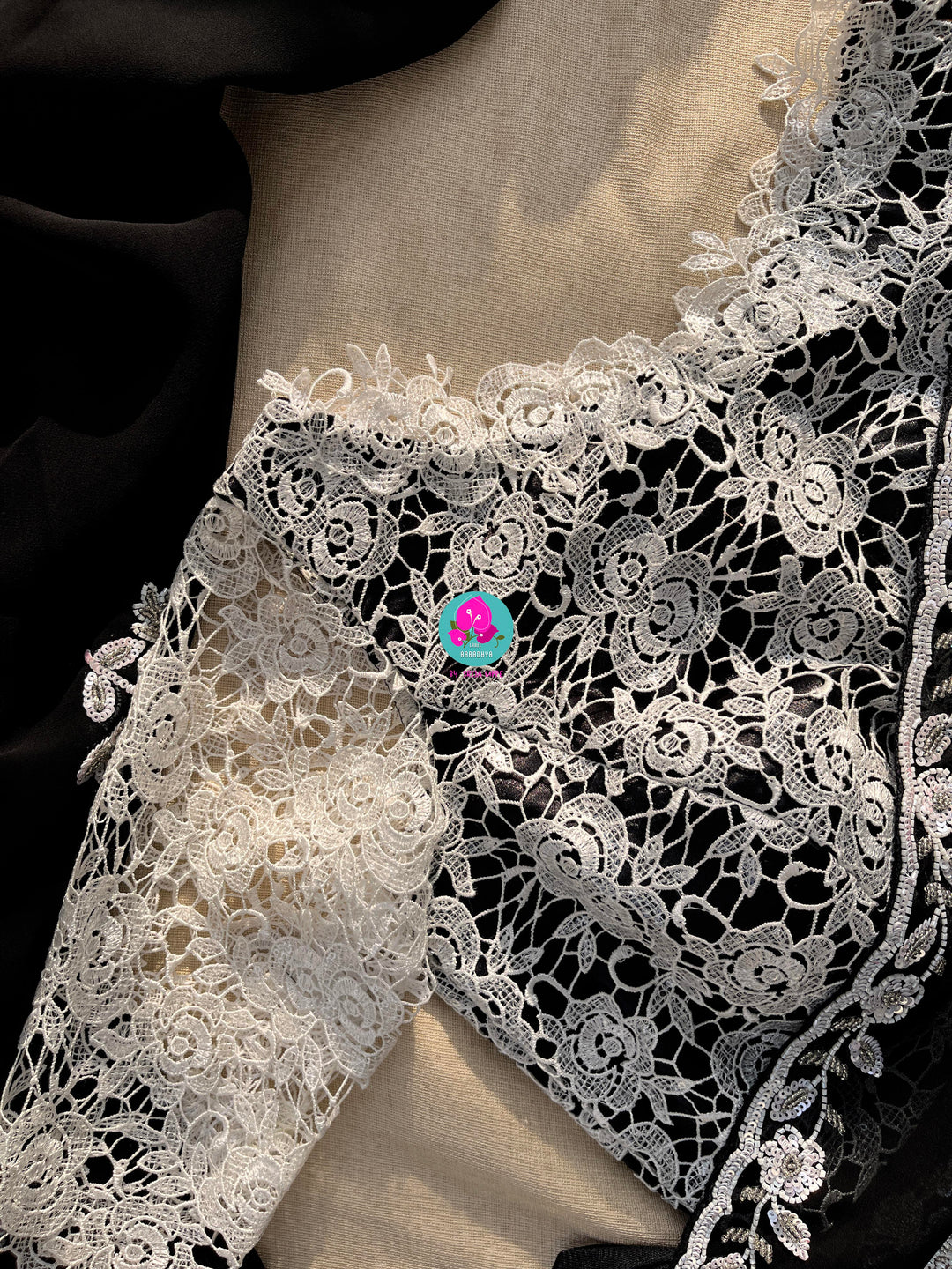 Hand embroidered georgette Ariel saree Paired white Rosy netted blouse with sequins