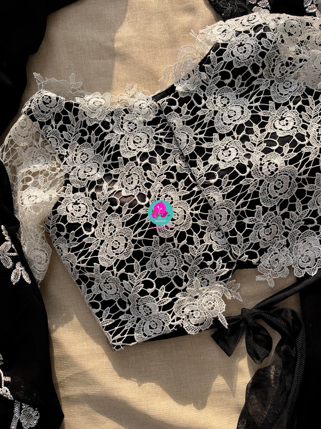 Hand embroidered georgette Ariel saree Paired white Rosy netted blouse with sequins