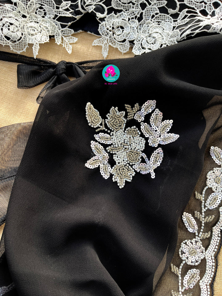 Hand embroidered georgette Ariel saree Paired white Rosy netted blouse with sequins