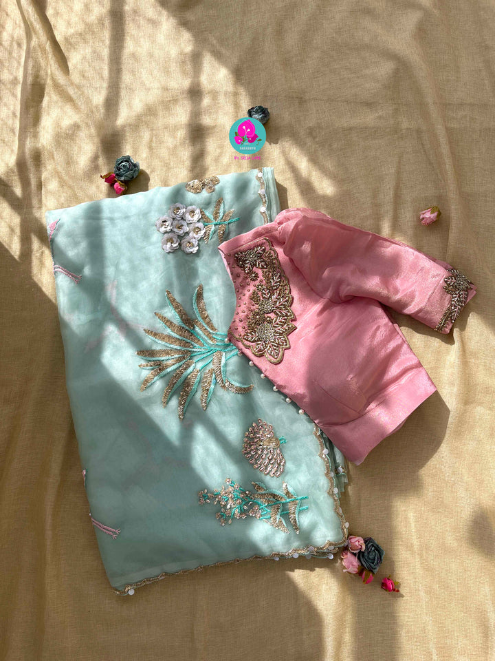 Featherlight Fantasy: Aqua Organza Saree with Embroidered Birds and Sequin Bloom