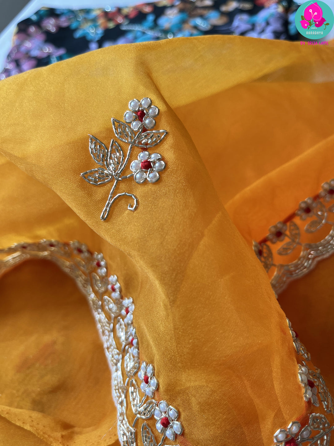Mustard soft organza silk hand embroidered saree with beautiful pearl, silver cutdana, bead and zardosi