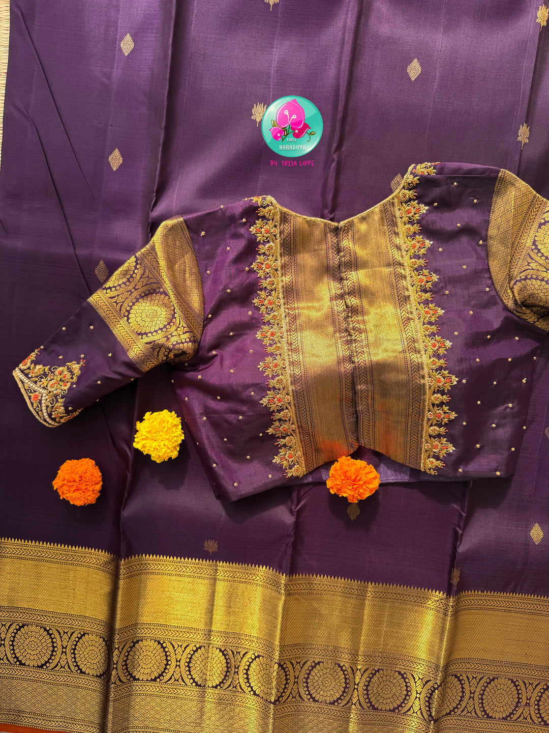 Imperial Plum & Gilded Zari: Deep Purple Pure Kanchipattu Silk Saree & Hand-Embroidered Maggam Blouse