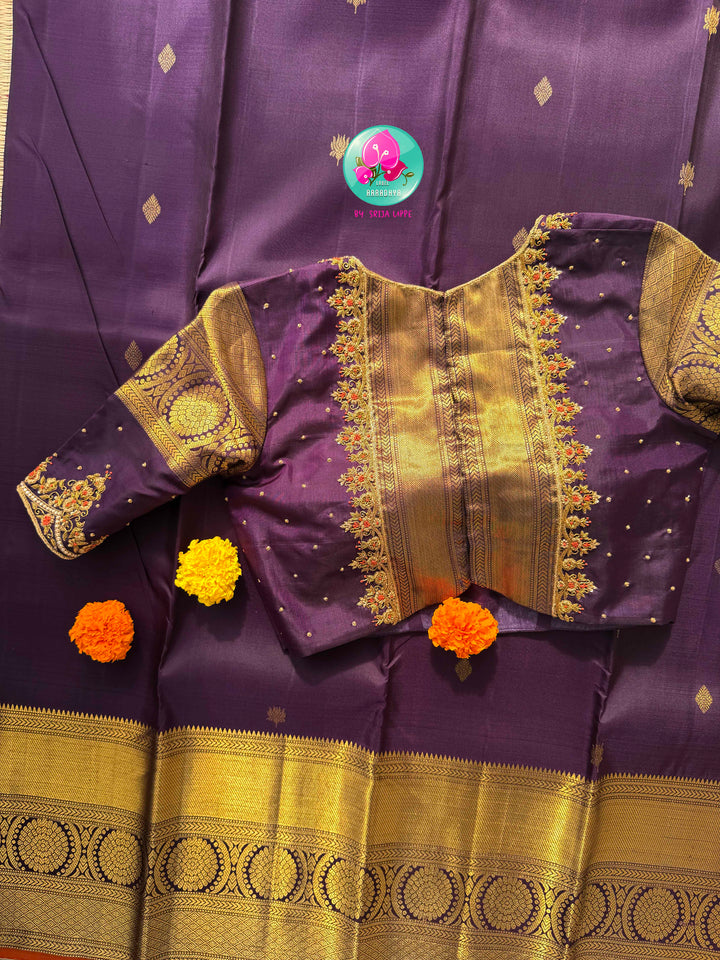 Imperial Plum & Gilded Zari: Deep Purple Pure Kanchipattu Silk Saree & Hand-Embroidered Maggam Blouse