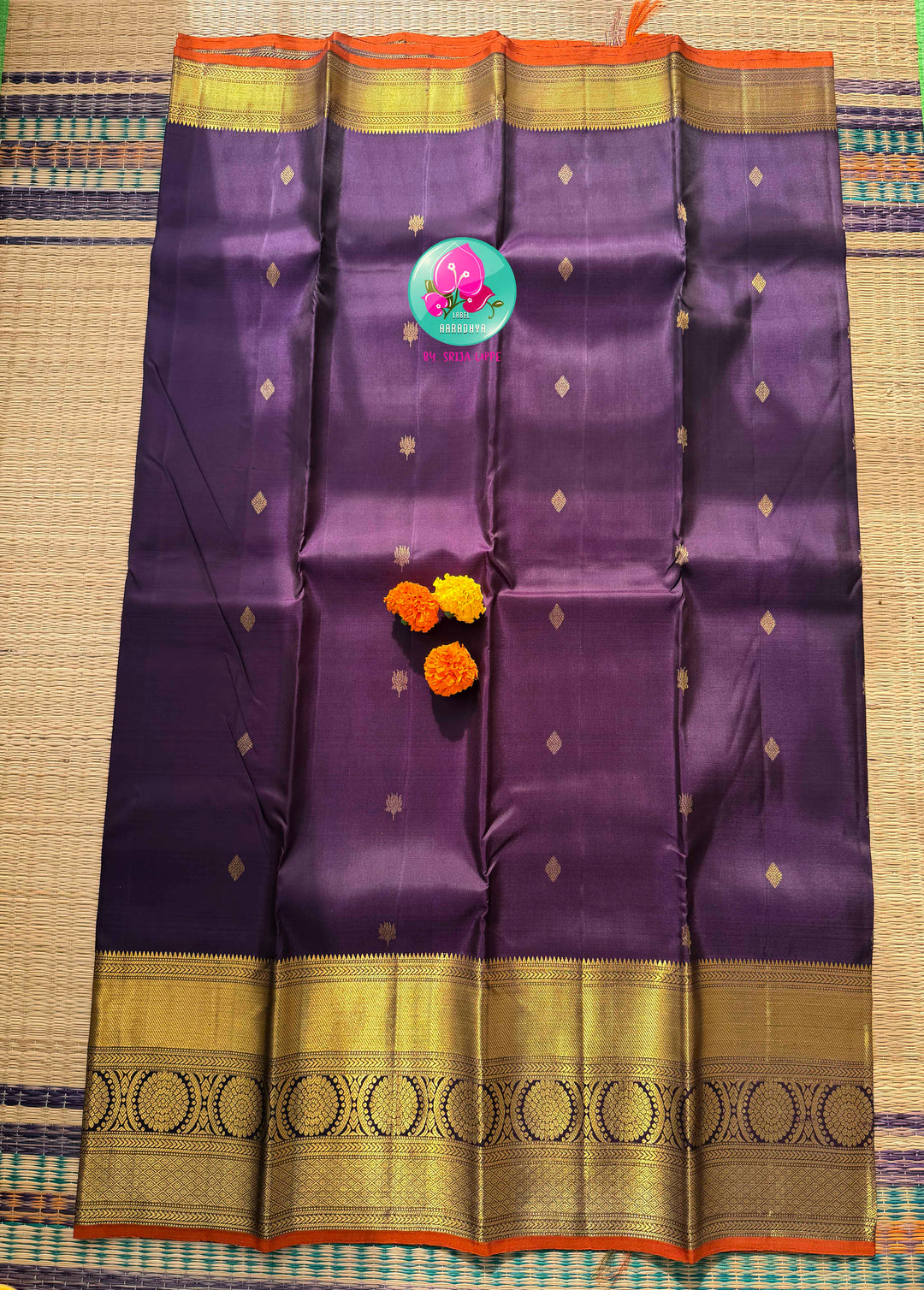 Imperial Plum & Gilded Zari: Deep Purple Pure Kanchipattu Silk Saree & Hand-Embroidered Maggam Blouse