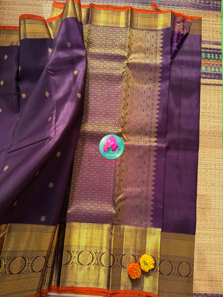 Imperial Plum & Gilded Zari: Deep Purple Pure Kanchipattu Silk Saree & Hand-Embroidered Maggam Blouse