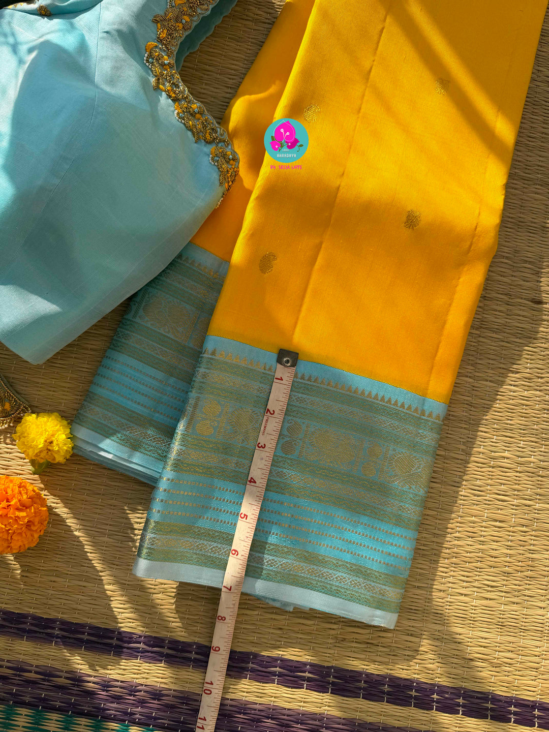 2G Zari Pure Kanchipuram saree with vintage mustard colour in hand embroidered light blue contrast blouse