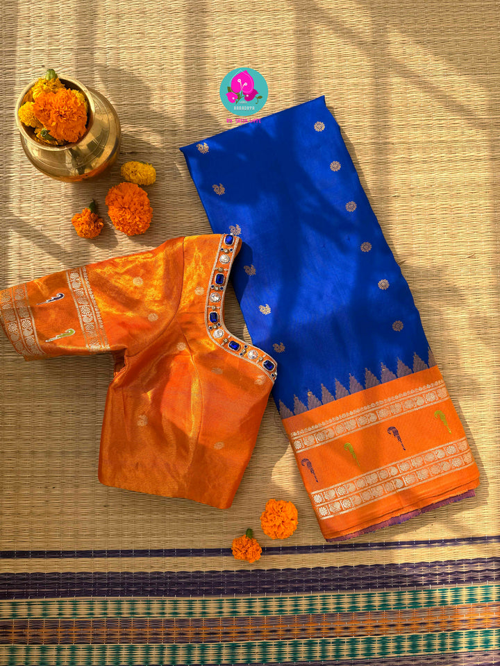 Sapphire Skies & Sunset Glow: Pure Tissue Gadwal Saree with Muniya Grandeur and Stone-Encrusted Artistry