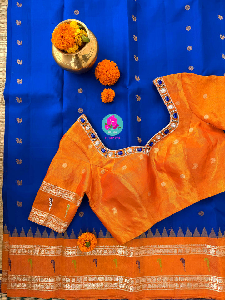 Sapphire Skies & Sunset Glow: Pure Tissue Gadwal Saree with Muniya Grandeur and Stone-Encrusted Artistry