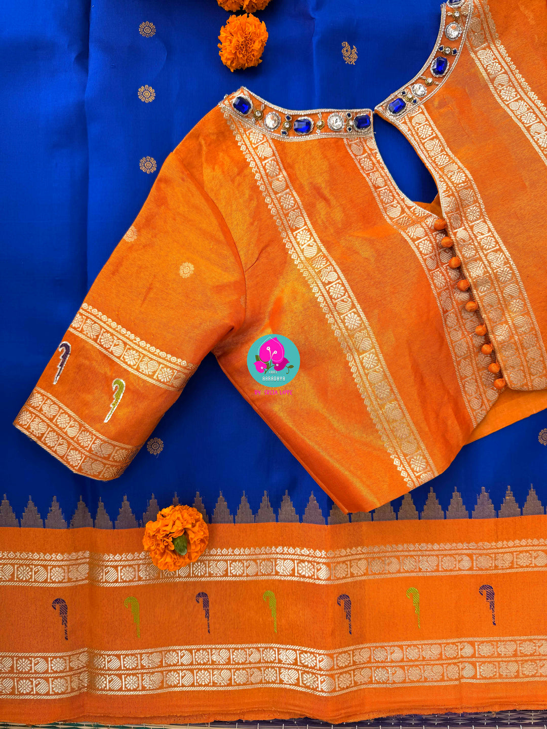Sapphire Skies & Sunset Glow: Pure Tissue Gadwal Saree with Muniya Grandeur and Stone-Encrusted Artistry