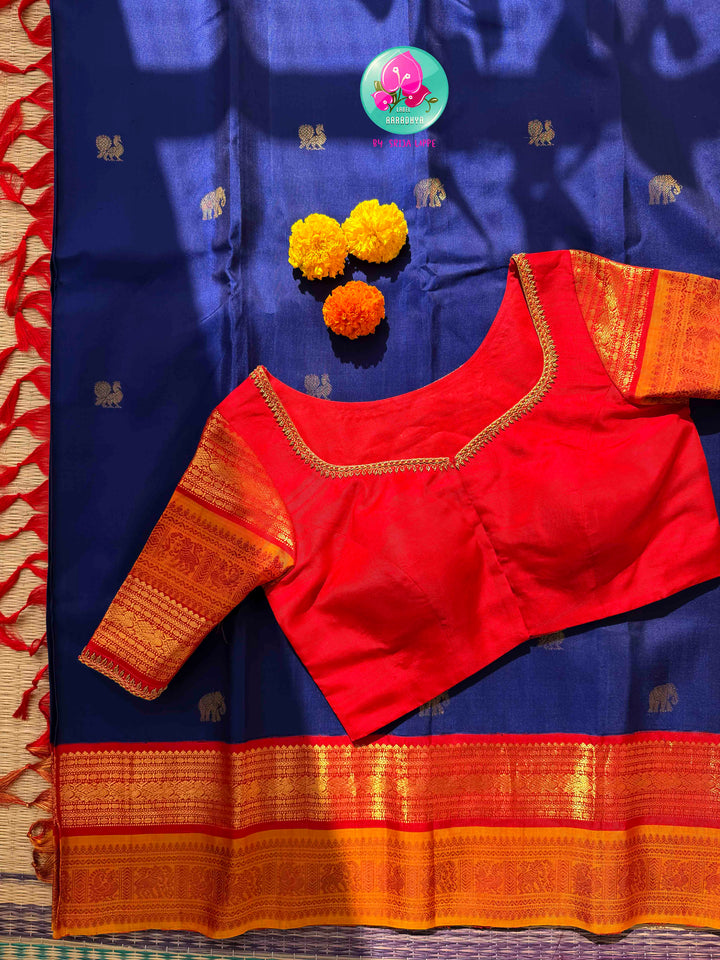 Sacred Temple Splendor: Vintage Royal Blue Kanchipattu Saree with Gopuram-Embroidered Crimson Blouse