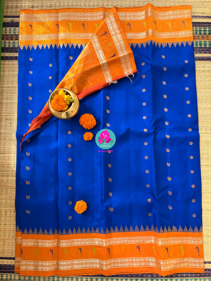 Sapphire Skies & Sunset Glow: Pure Tissue Gadwal Saree with Muniya Grandeur and Stone-Encrusted Artistry