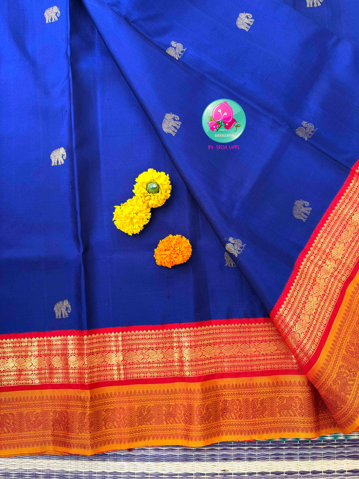 Sacred Temple Splendor: Vintage Royal Blue Kanchipattu Saree with Gopuram-Embroidered Crimson Blouse