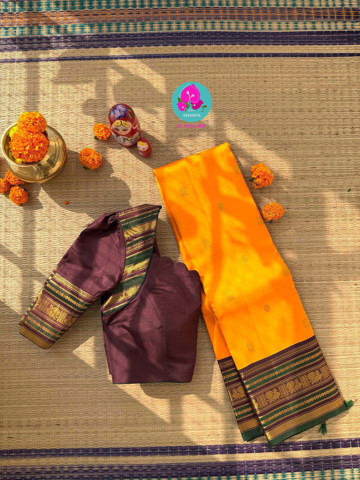 A Harvest of Gold: Mustard Yellow Kanchipattu with a Deep Earth-Brown Zari Border