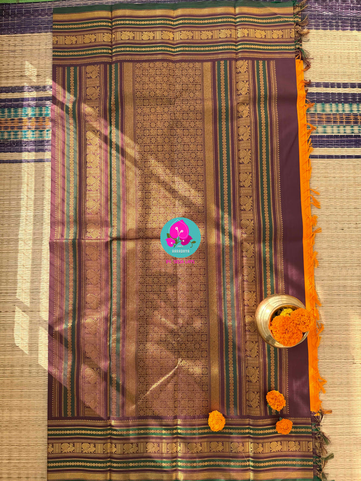 A Harvest of Gold: Mustard Yellow Kanchipattu with a Deep Earth-Brown Zari Border