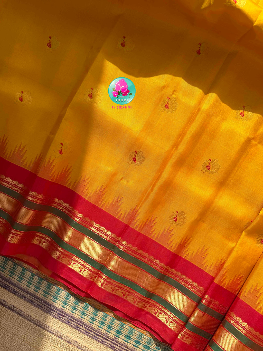 Ethereal Sunset Glow: Sunshine Yellow Gadwal Silk Saree with 1g gold zari kanchi border fusion paired with Hand-Embroidered Crimson Red Blouse
