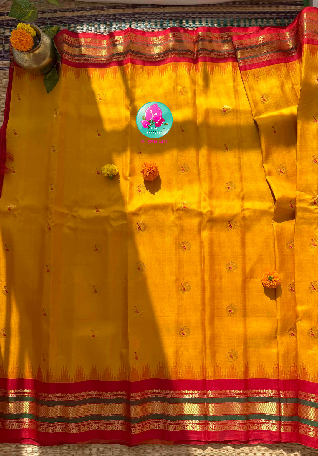 Ethereal Sunset Glow: Sunshine Yellow Gadwal Silk Saree with 1g gold zari kanchi border fusion paired with Hand-Embroidered Crimson Red Blouse