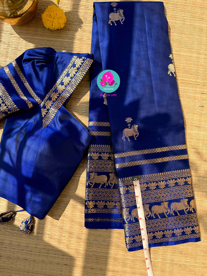 Celestial Sapphire: Royal Blue Pure Kanchipattu Saree with Antique Zari & Artisan Nandhini Motifs