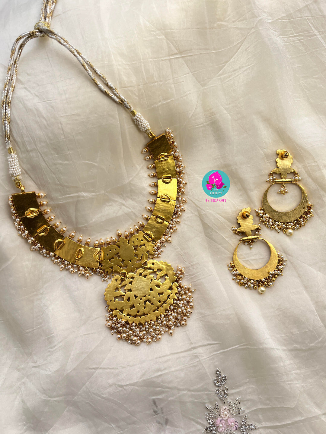 Jadau Kundan Heavy Necklacewith 22K genuine gold plating on a premium alloy Paired with Chandbali earrings