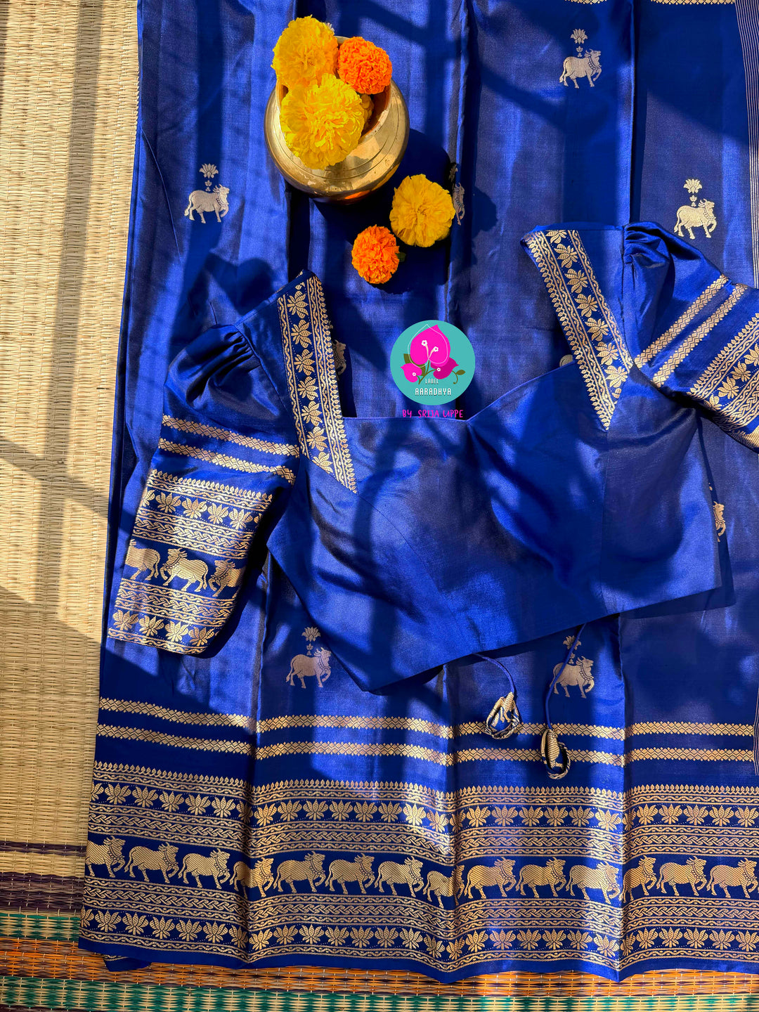Celestial Sapphire: Royal Blue Pure Kanchipattu Saree with Antique Zari & Artisan Nandhini Motifs