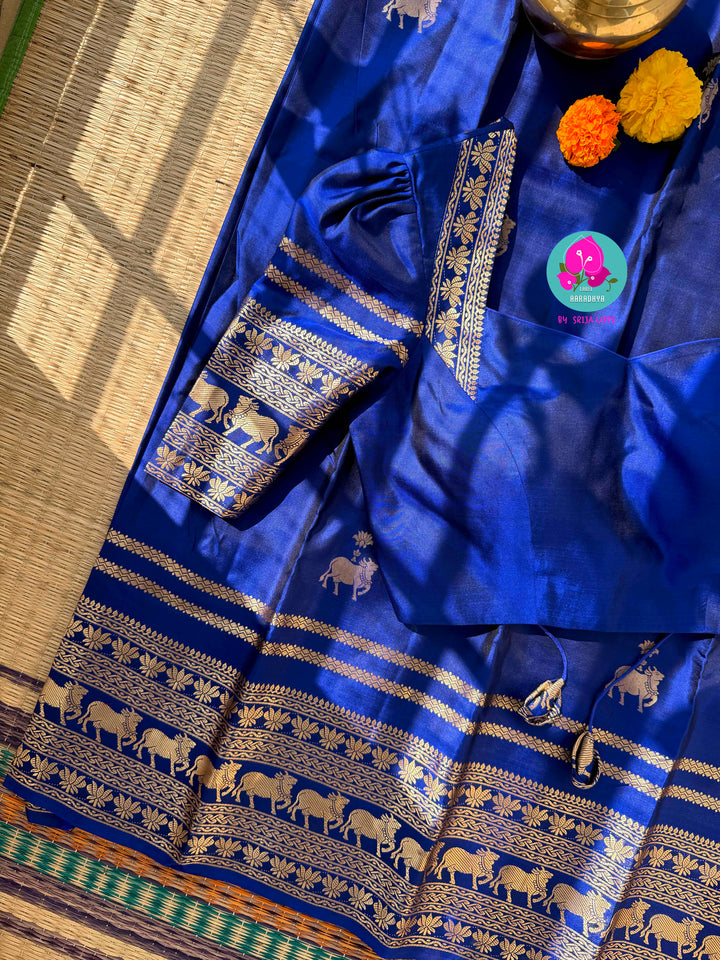 Celestial Sapphire: Royal Blue Pure Kanchipattu Saree with Antique Zari & Artisan Nandhini Motifs