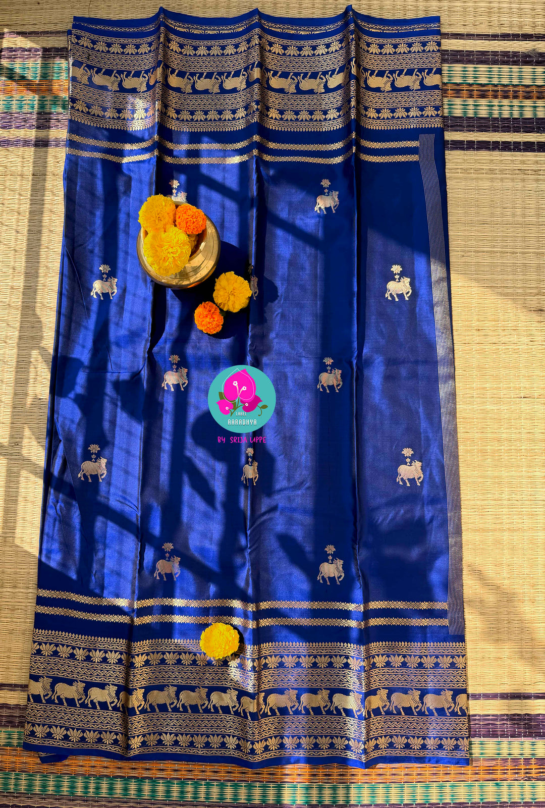 Celestial Sapphire: Royal Blue Pure Kanchipattu Saree with Antique Zari & Artisan Nandhini Motifs