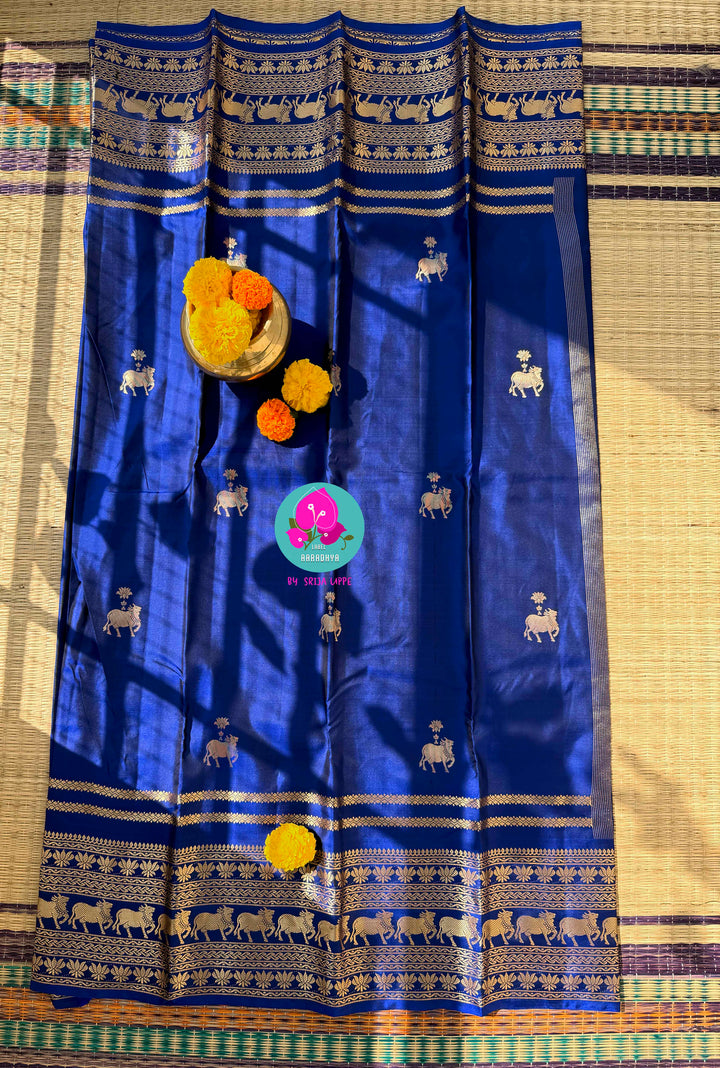 Celestial Sapphire: Royal Blue Pure Kanchipattu Saree with Antique Zari & Artisan Nandhini Motifs