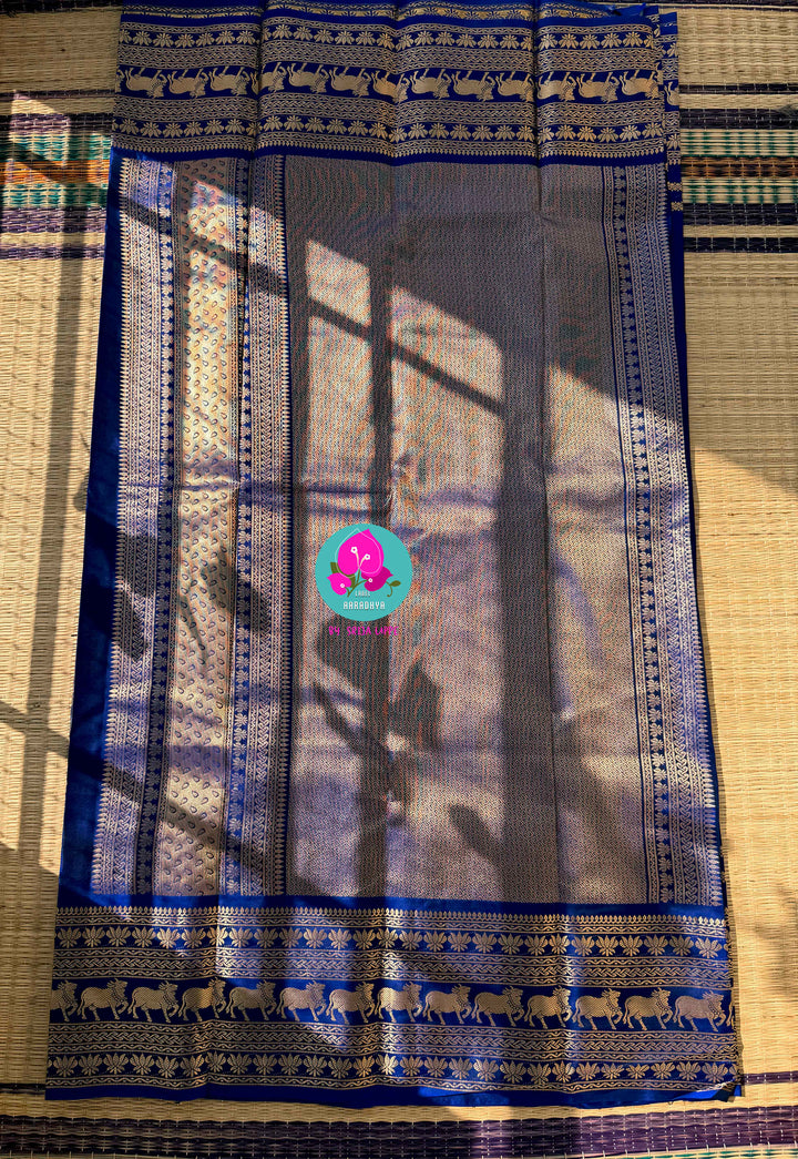 Celestial Sapphire: Royal Blue Pure Kanchipattu Saree with Antique Zari & Artisan Nandhini Motifs